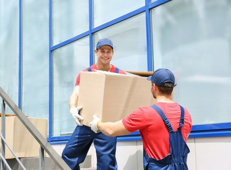 Mover carrying student furniture during Tufnellpark relocation