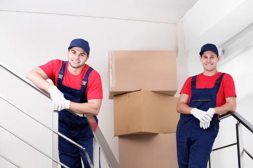 Local furniture moving team handling household items in Tufnellpark
