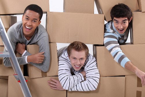 Preparing boxes and furniture for a moving truck in Tufnellpark